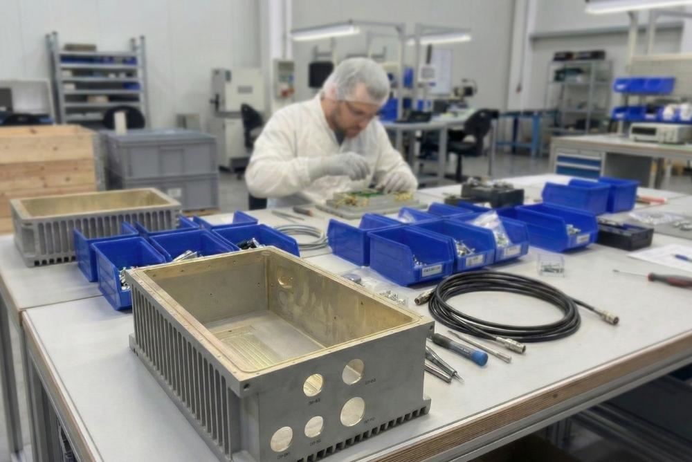 Cleanroom assembly of electronics into machined aluminum enclosure