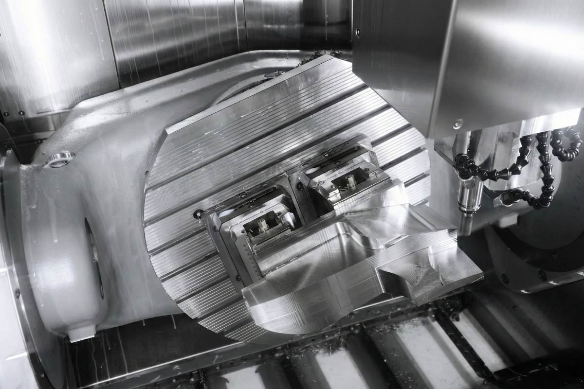 Large plate machined on a five axis milling table