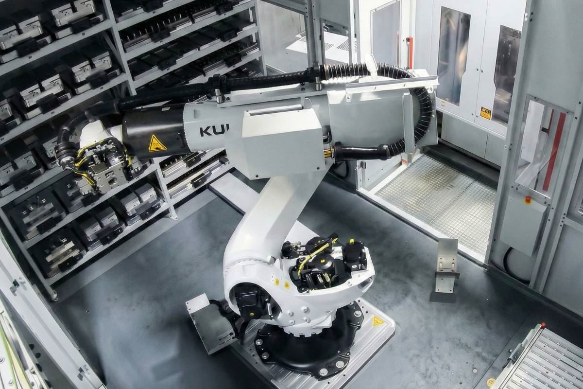 Robot arm reaching into pallet storage rack